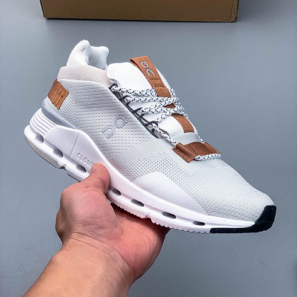 On Running White and Tan Sneakers